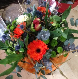 Contemporary orange flowers for delivery